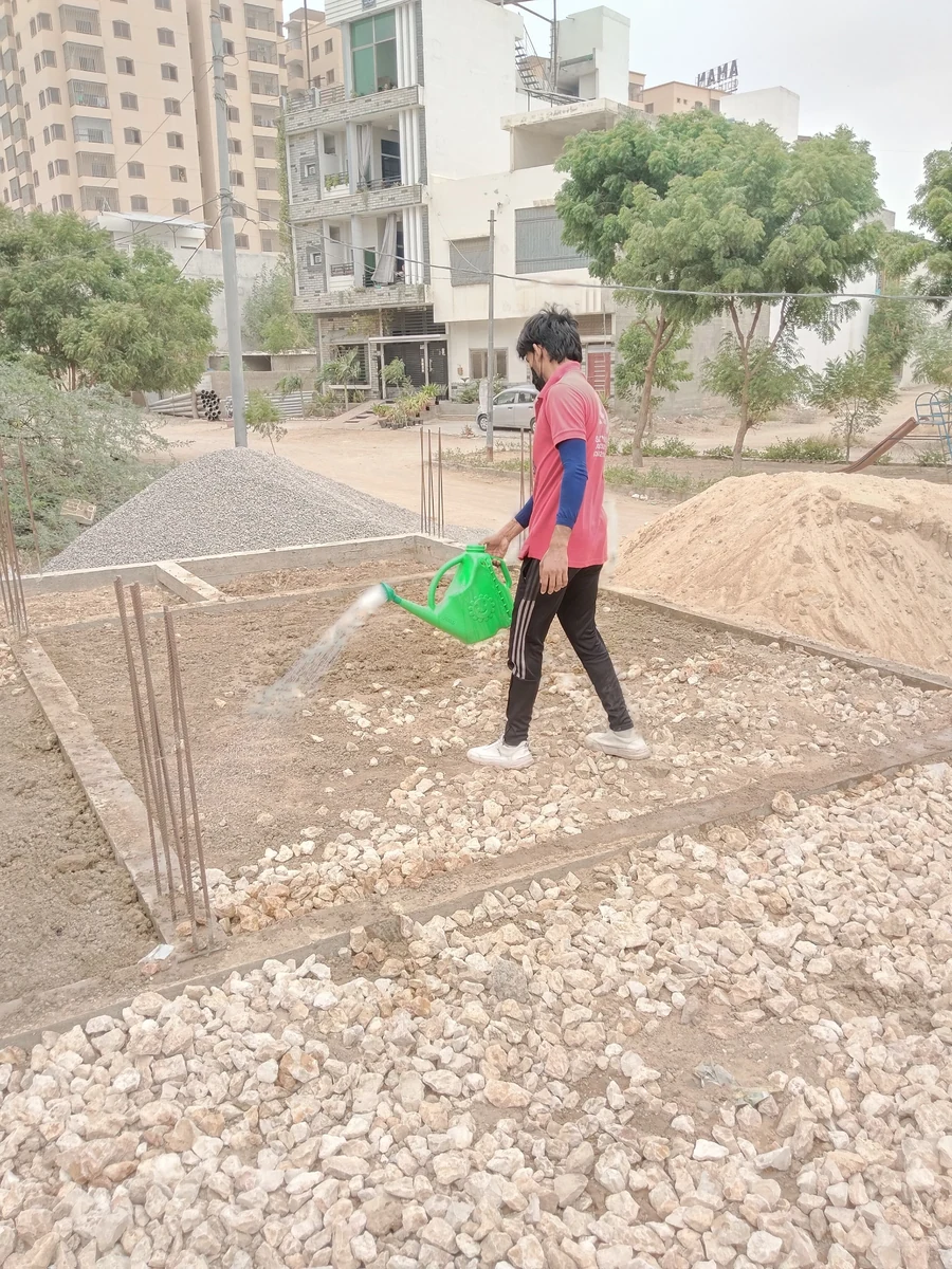 Rana Jee’s technician treating a construction-site foundation